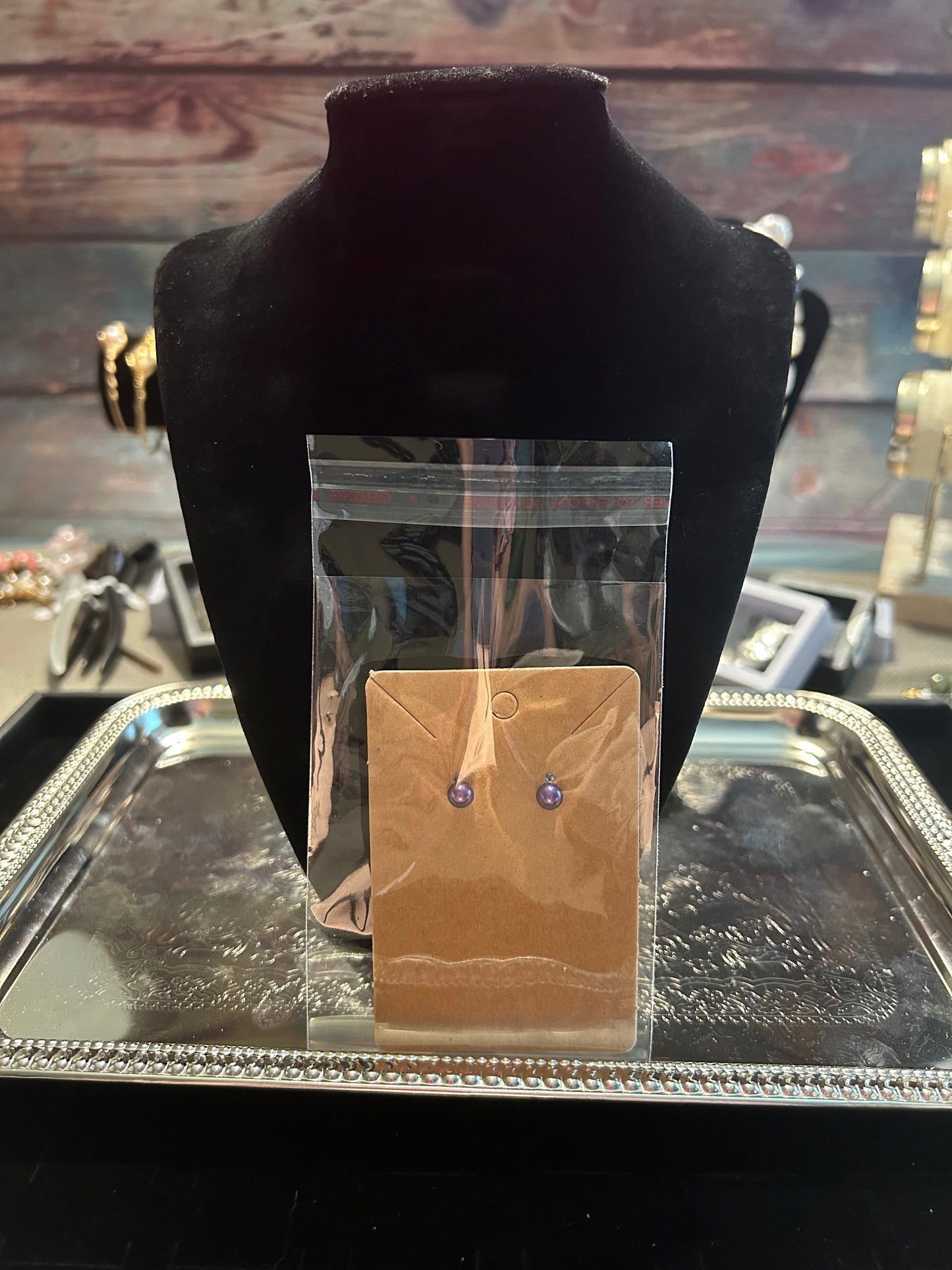 Small purple stud earrings