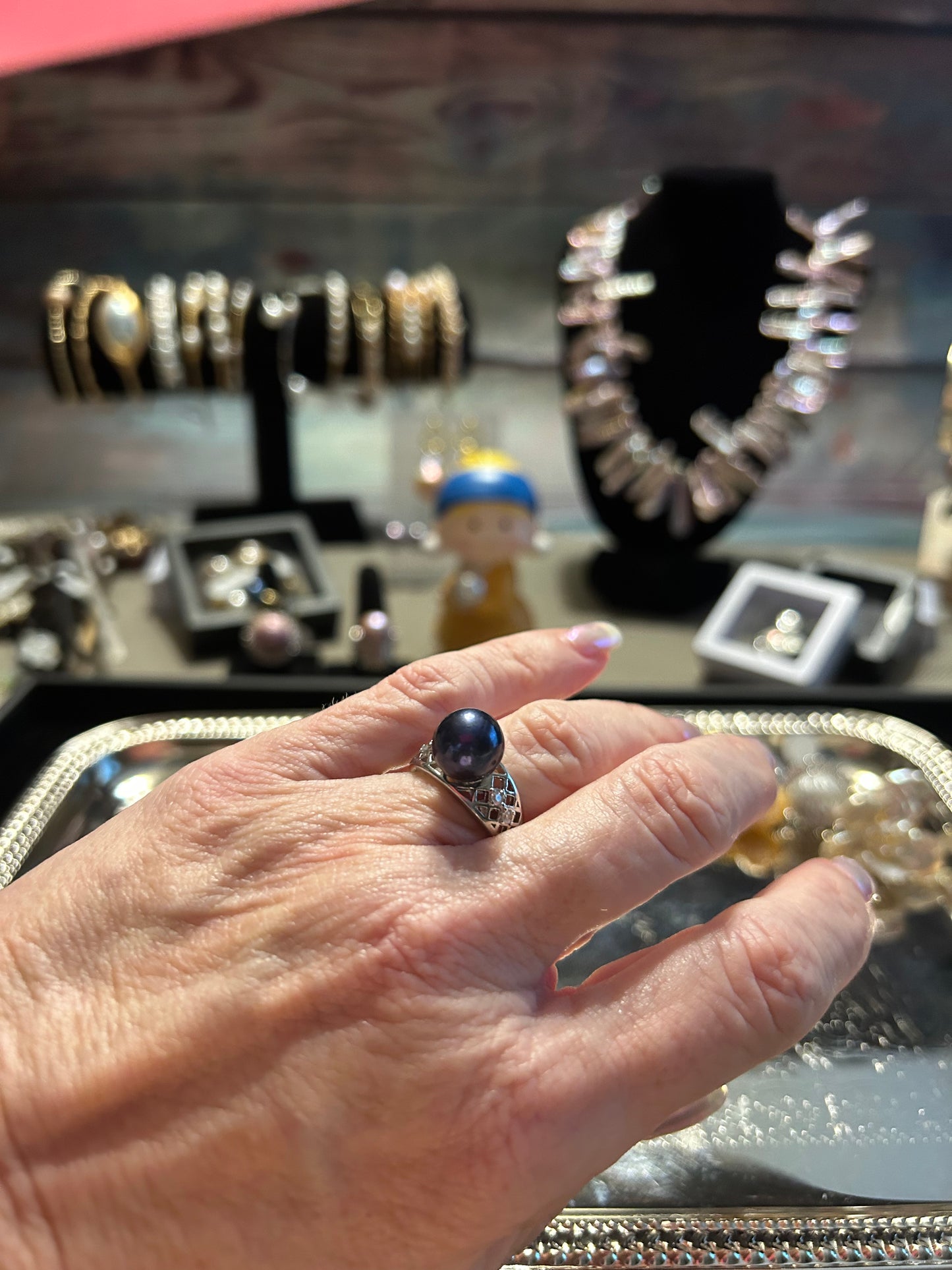 Blue Edison in silver ring