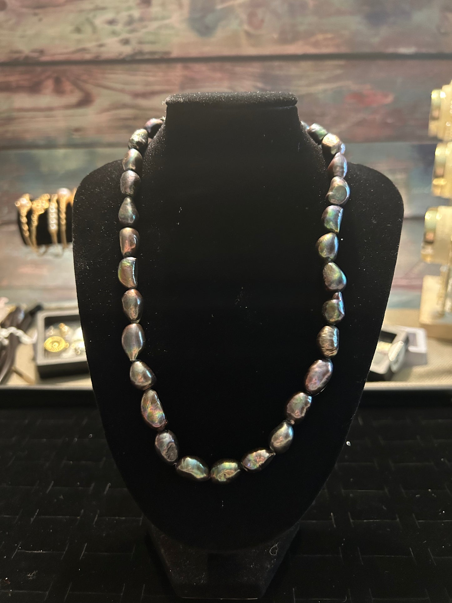 Full medium sized baroque green & purple hued necklace