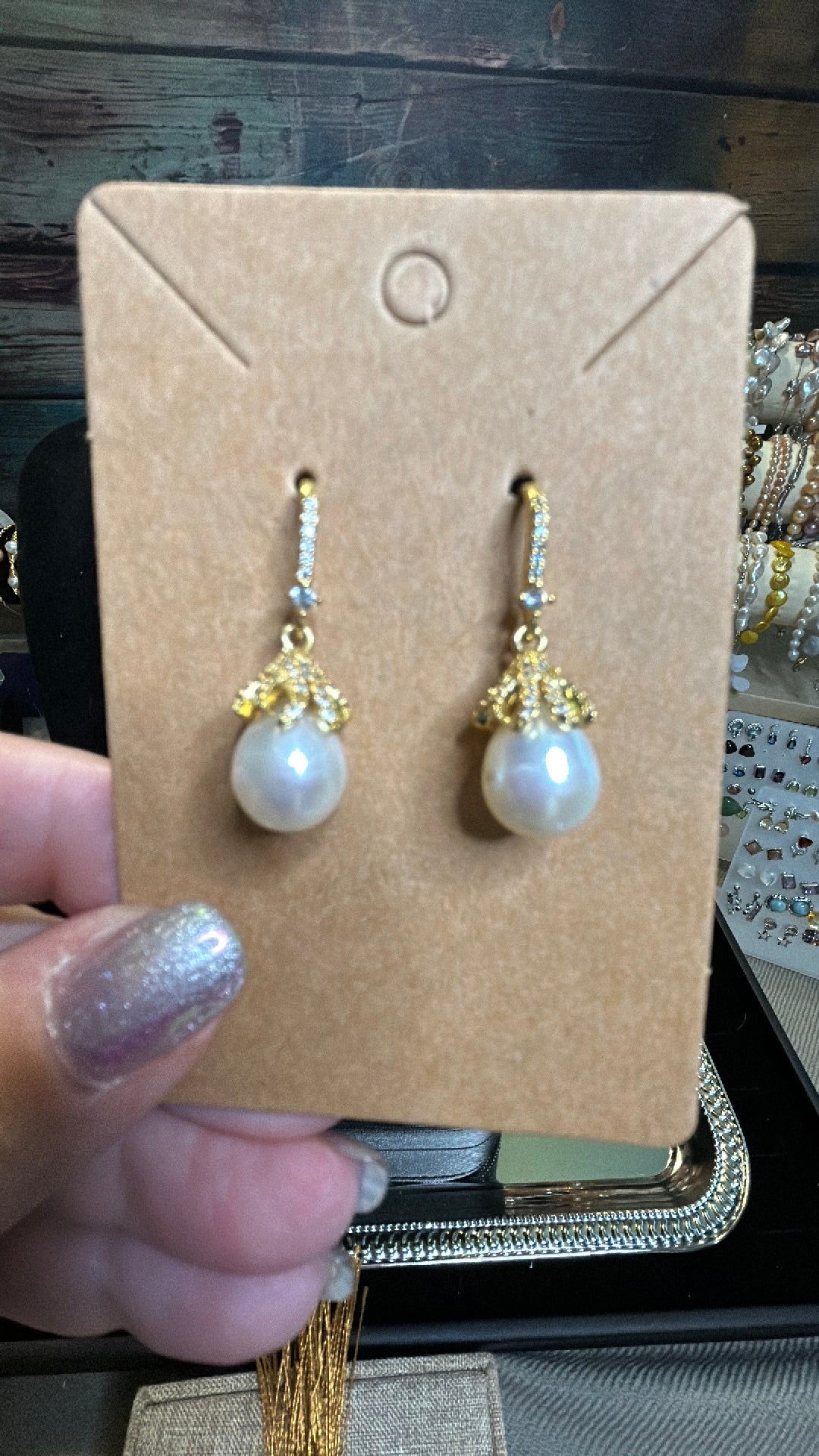 Dangling white pear earrings