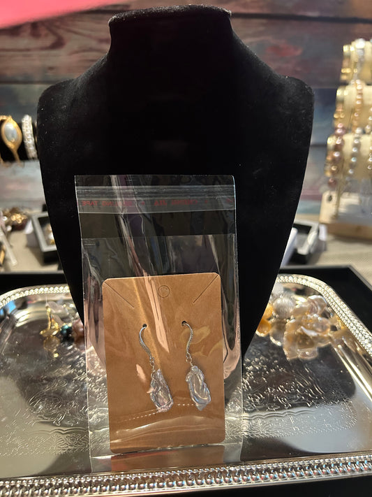 Long silver baroque earrings