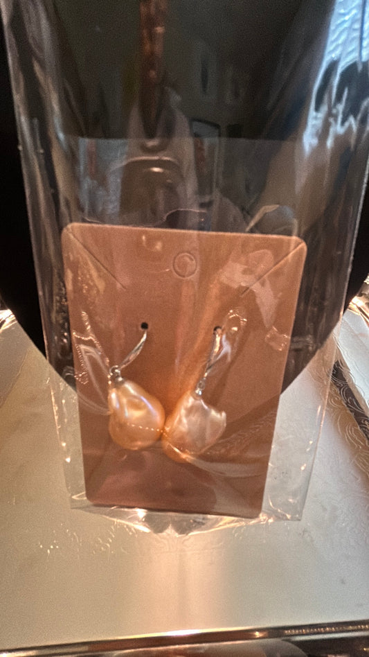 Huge peach colored baroque earrings