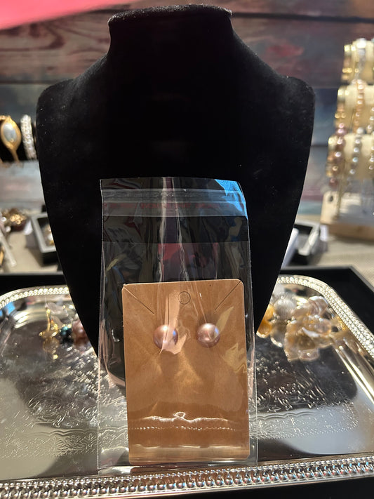 Large mauve stud earrings