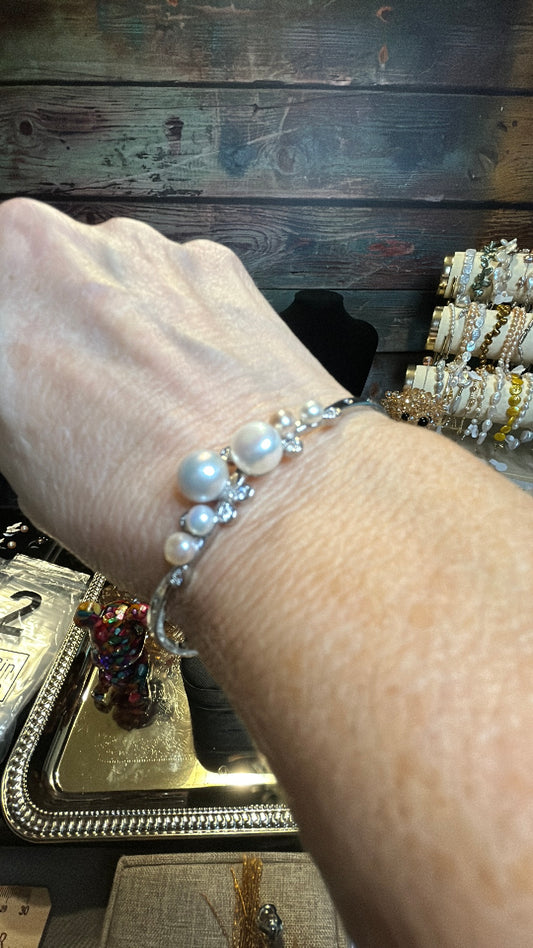 Silver cuff bracelet with freshwater pearls