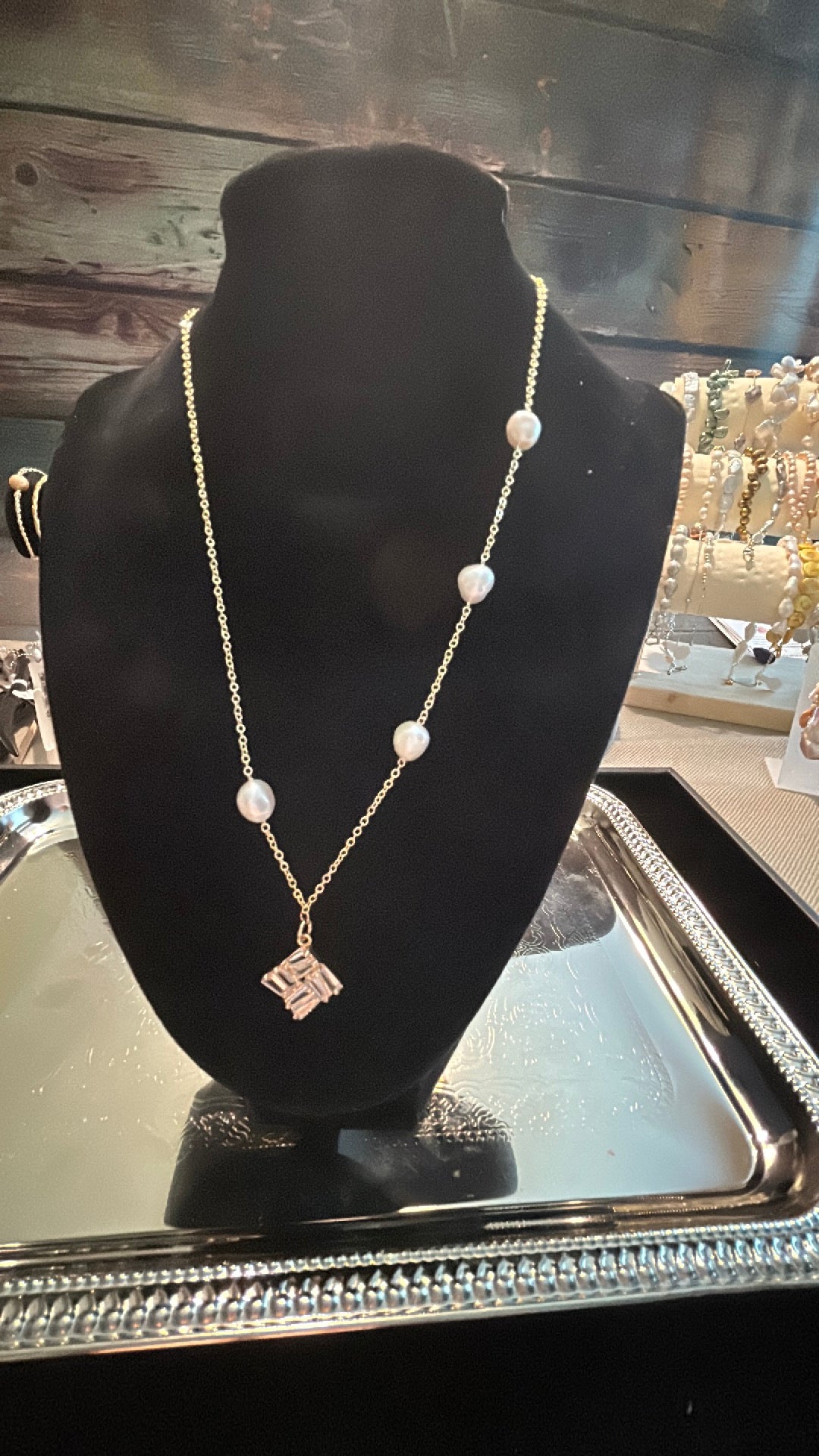 Golden freshwater pearl necklace with crystal pendant