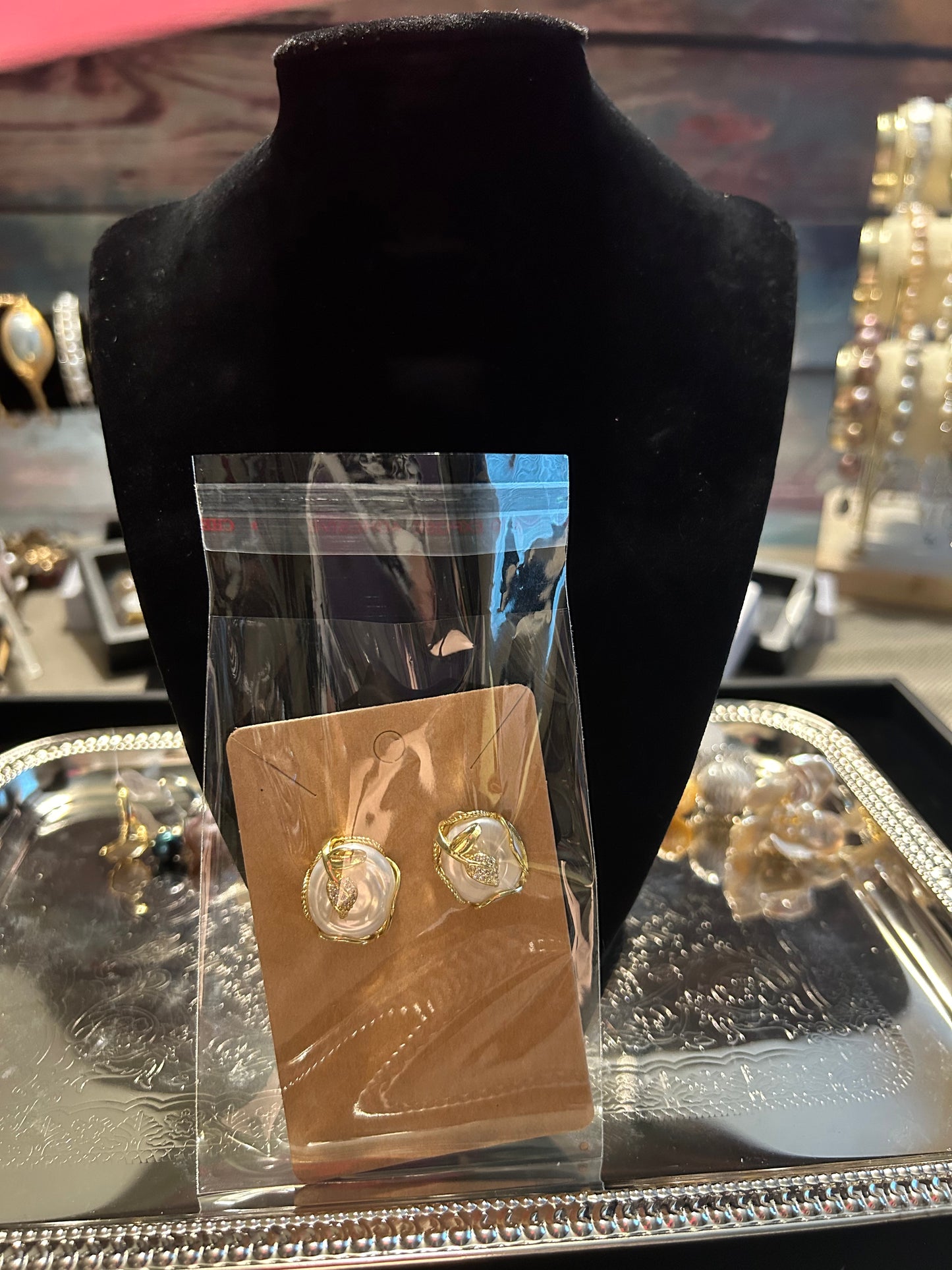 Round baroque dangling earrings with gold accents