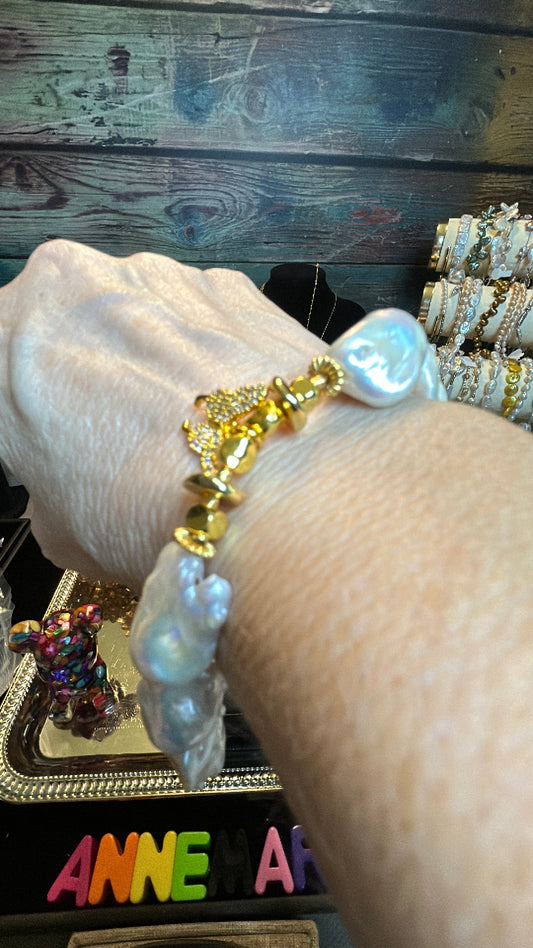 White baroque bracelet with butterfly charm